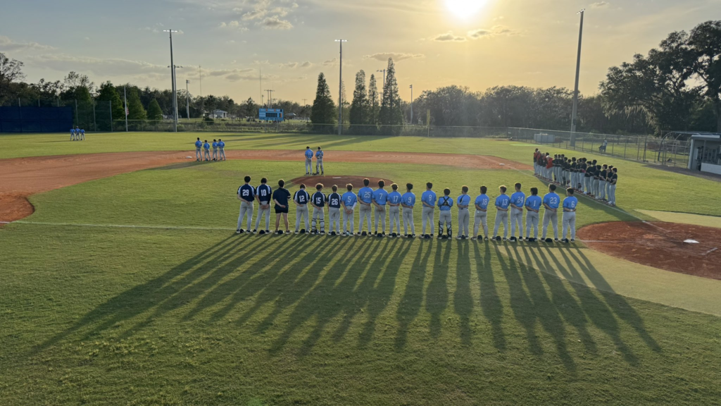 Newsome Baseball lining up for the national anthem.